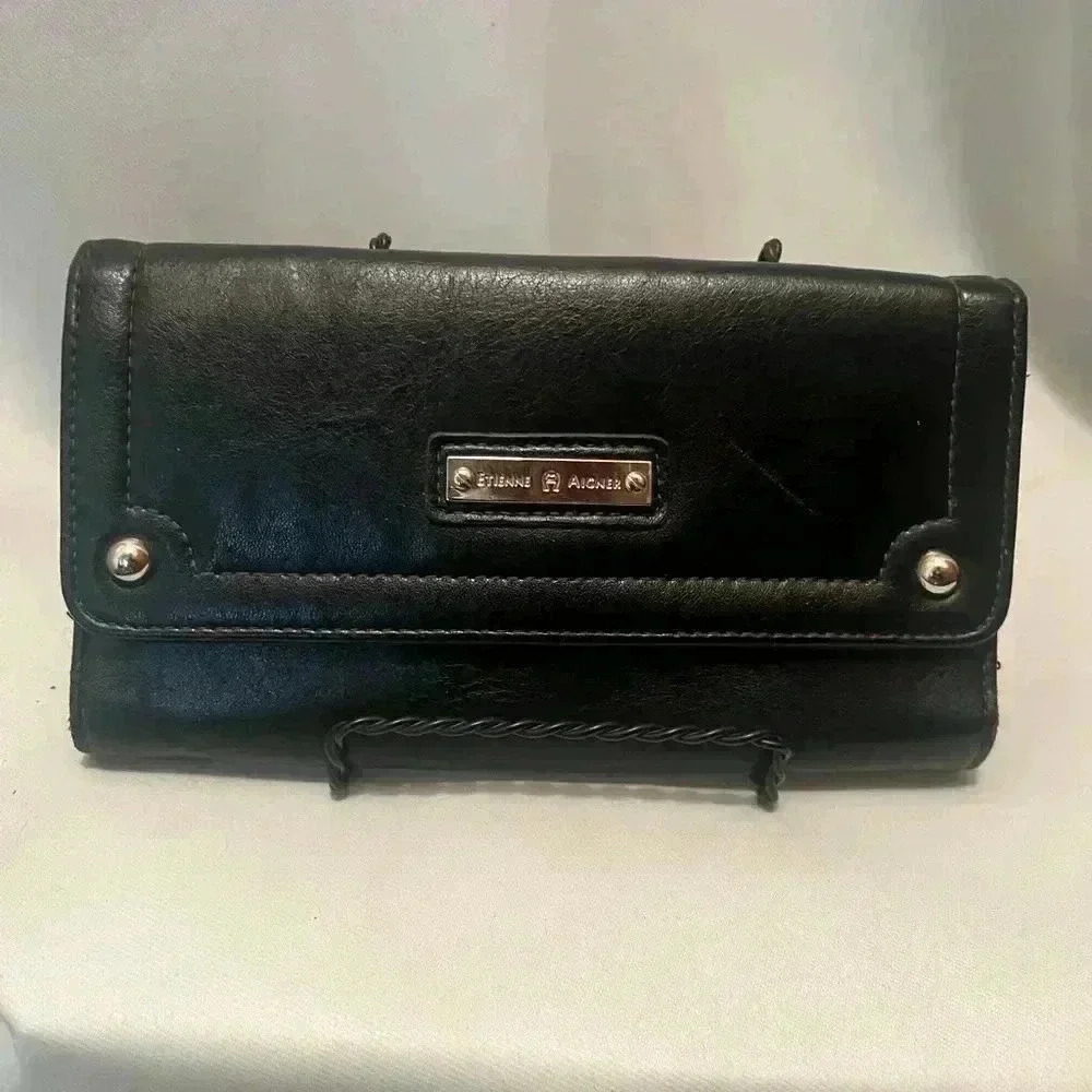 Etienne Aigner black leather wallet. Sz 7.5”x4”